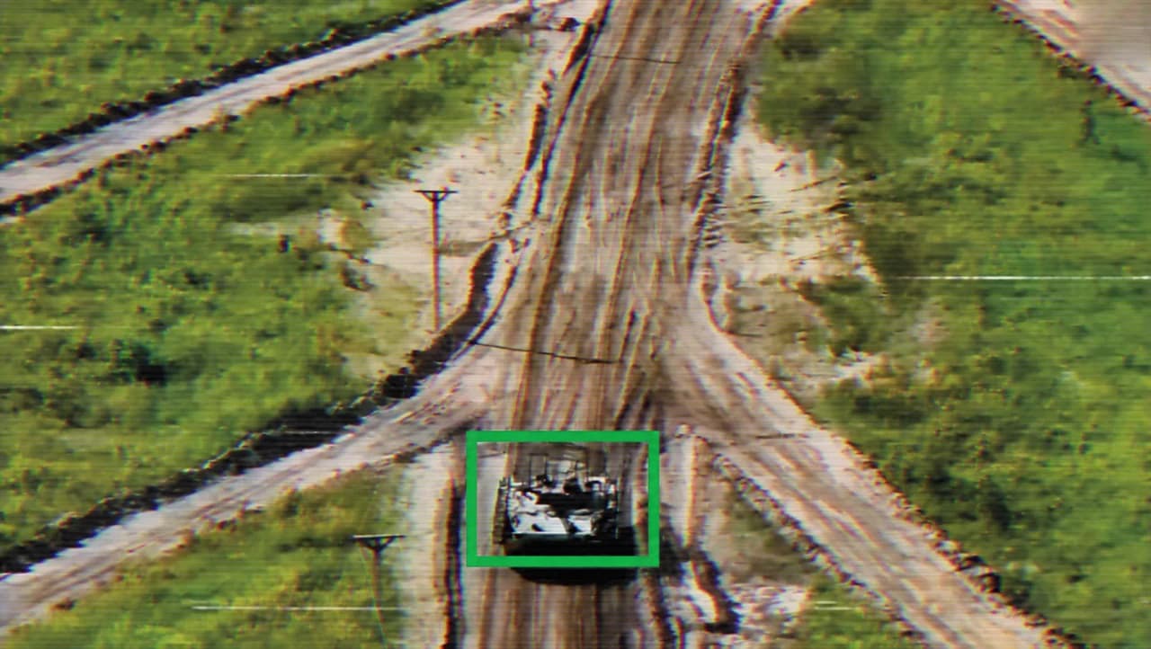 Supplied overhead road image with an analog video treatment and the original green frame